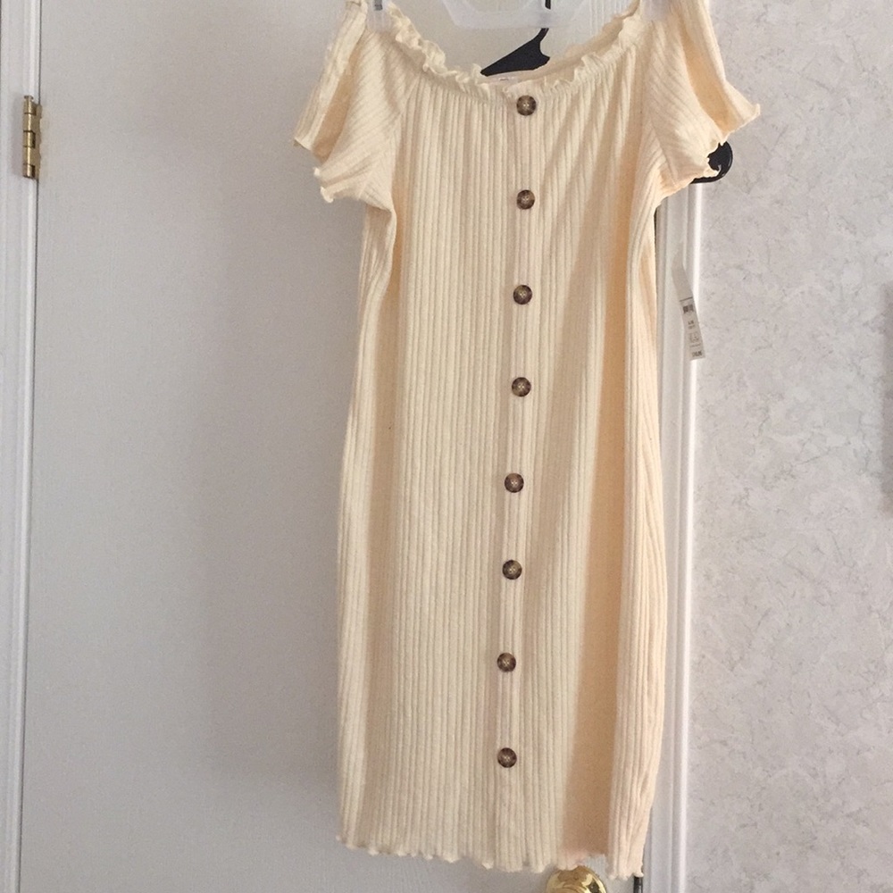 Cream colored, off the shoulder dress with buttons